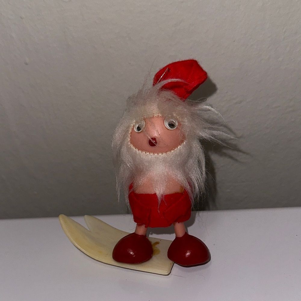 Vintage 60s/70s plastic Google Eyes sSanta Claus riding a‎ ski or snowboard